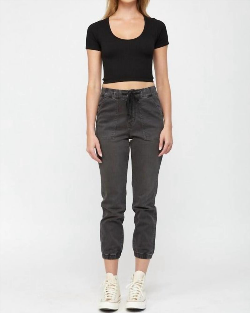 Front of a model wearing a size Large High Rise Jogger Crop Jean in Pickle in Pickle by mica denim. | dia_product_style_image_id:339271